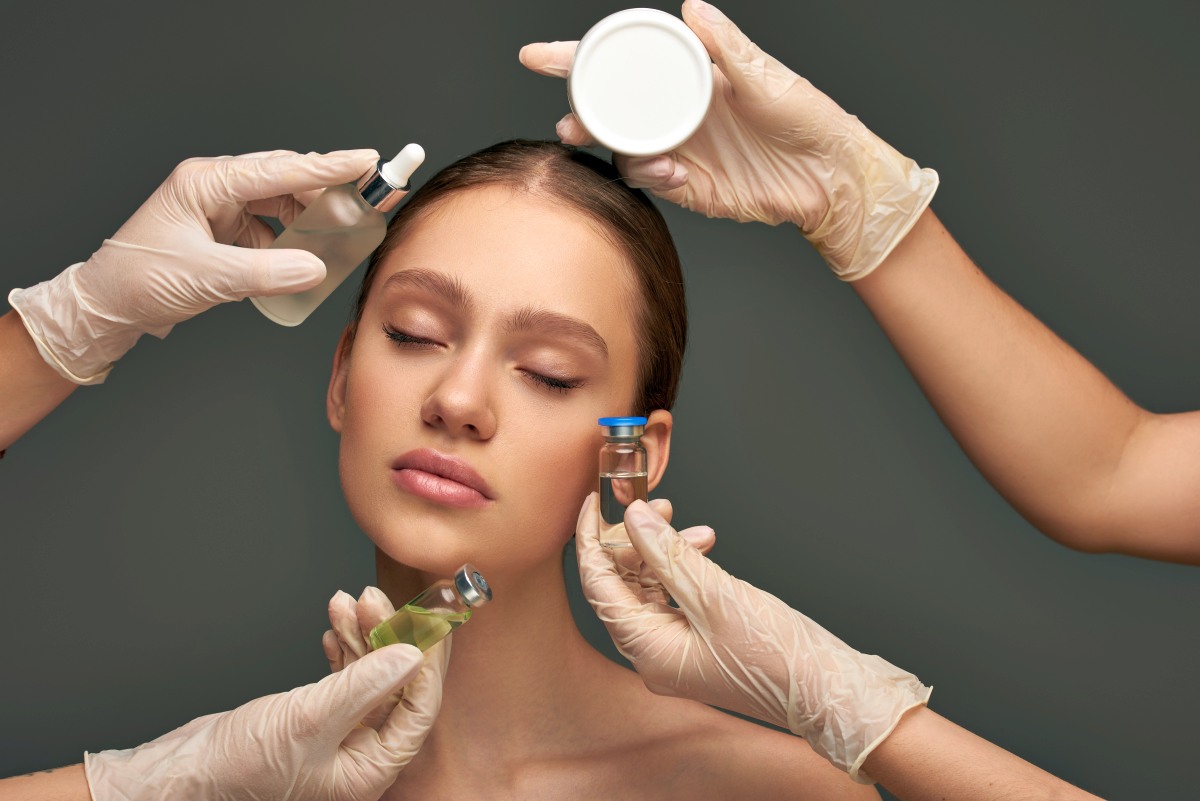 estheticians in medical gloves holding beauty trea 2024 11 10 05 10 36 utc